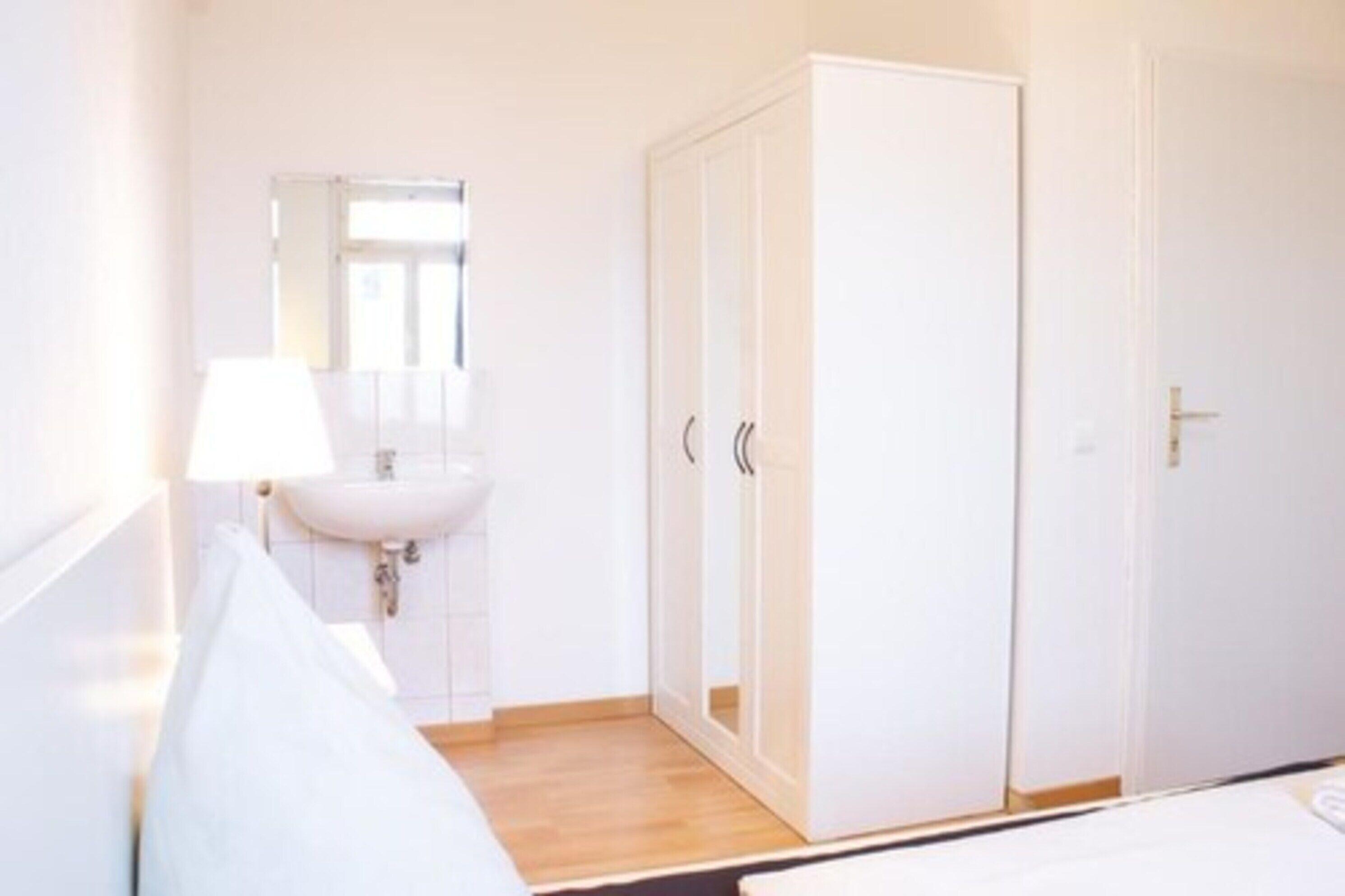 Camera Quadrupla con Bagno in Comune
